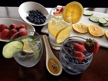 blueberries, berries, strawberries, lemon, orange, lemon water, berry water, lime, cucumber water, lemon and cucumber water, fruits