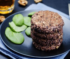 black beans brown rice walnut oat burgers with spinach. toning. selective focus