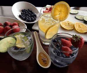 blueberries, berries, strawberries, lemon, orange, lemon water, berry water, lime, cucumber water, lemon and cucumber water, fruits